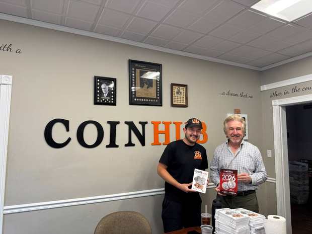 Blake Alma and Jeff Garrett posing with their coin publications