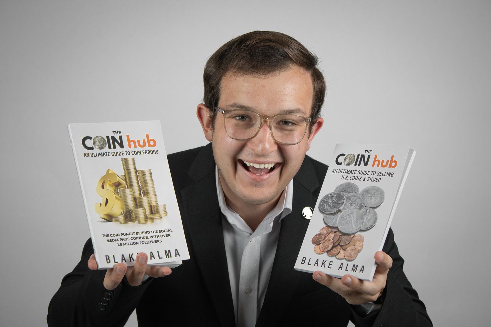 Blake Alma with his best selling coin books